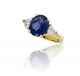 Oval Sapphire and Trillion Diamond Three Stone Ring in Platinum and 18k Yellow Gold (3.65ct. Center)