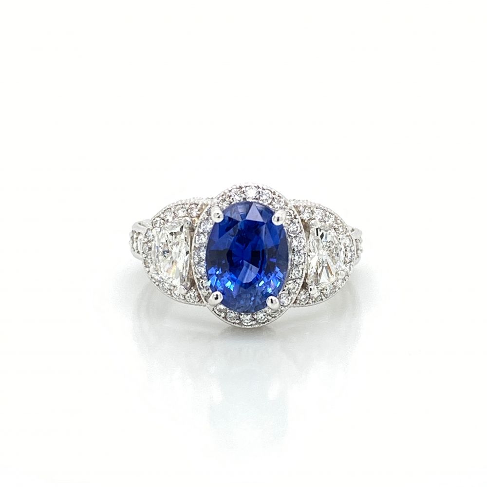 Oval Sapphire and Diamond Halo Three Stone Ring in 14k White Gold 3.12ct center