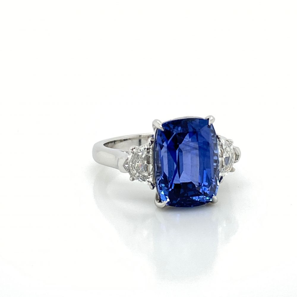 Cushion cut diamond with sales sapphire side stones