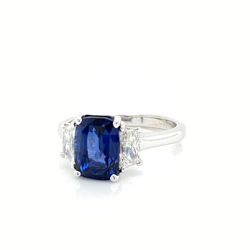 Cushion cut diamond with sales sapphire side stones