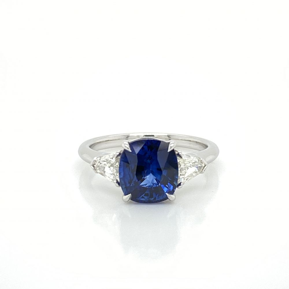 Cushion cut sapphire and sales diamond ring